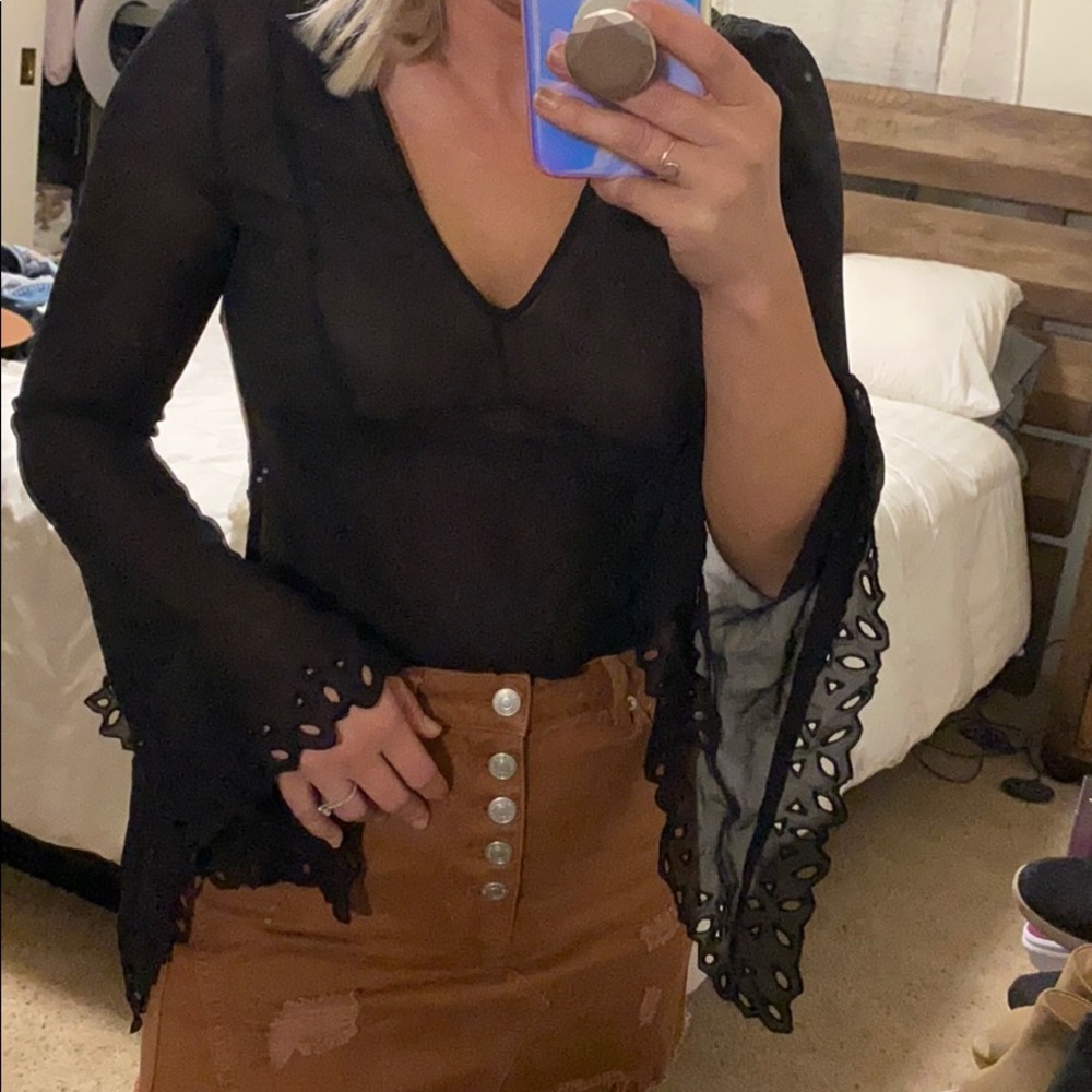 Sheer black crochet bell sleeve top
